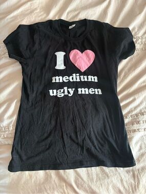 TC Black Tee with White Text and Pink Heart